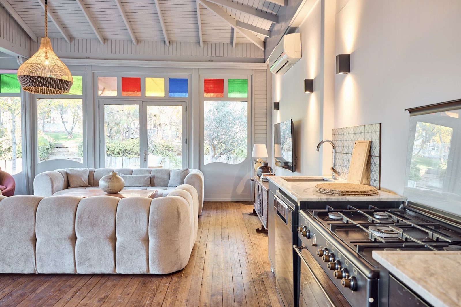 The living room and kitchen